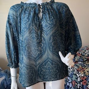Navy teal sheer blouse with gathered 3/4 sleeves.